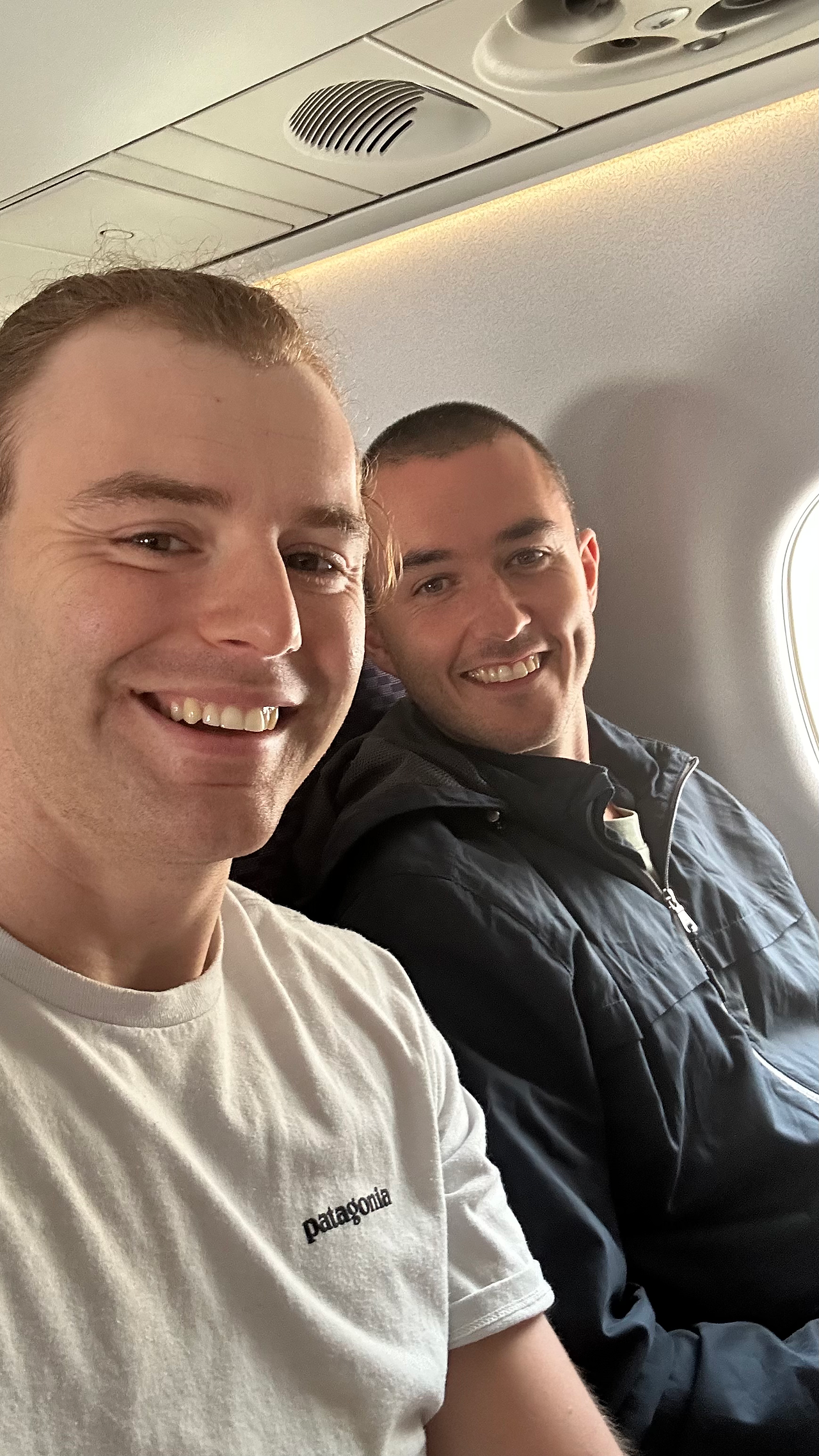 Mitch and Tom on the plane flying to Canberra