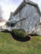 Mulched flower bed by Eldersburg local landscape company