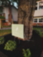Eldersburg local landscape company yard sign in garden bed