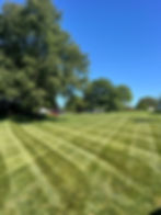 Expertly mowed lawn by Eldersburg local landscape company