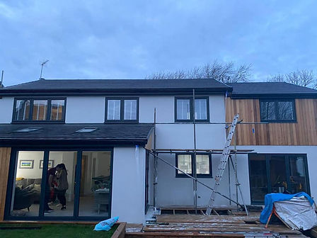 Rear facing property with conservatory extension, recently applied external rendering