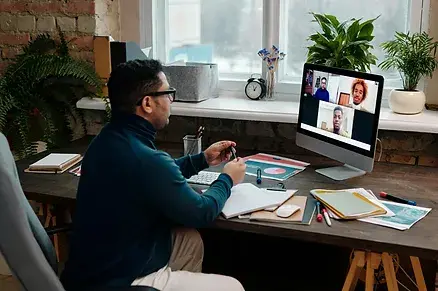 Diverse group of students in an online GMAT study session with video call