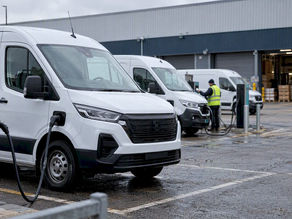 Electric fleet vans charging at a depot