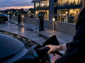 Employee starting workplace EV charging session