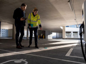Surveyors inspecting commercial charging infrastructure