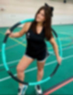 Anna in her first month of teaching hula hoop fitness