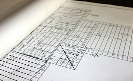 Blueprints On Desk