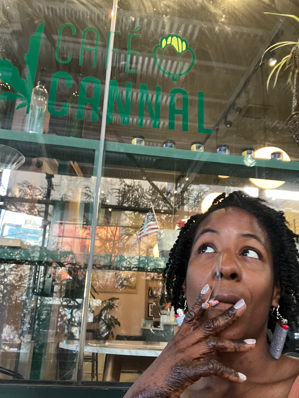 Author smoking joint at Cafe Cannal
