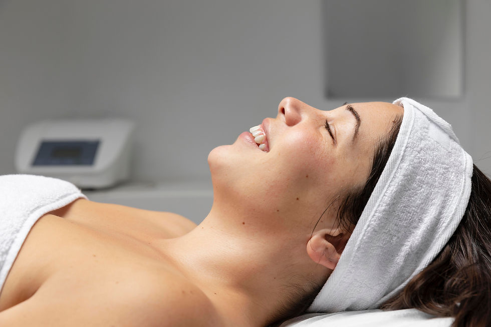 young-woman-having-facial-skincare-treatment.jpg