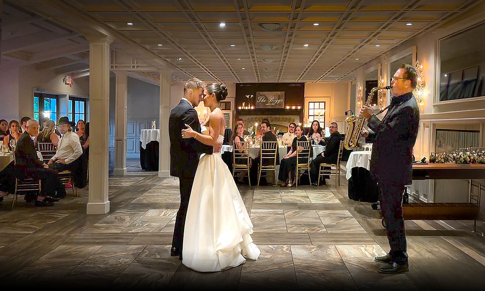 A sax player for events performing for a wedding dance.