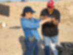 Instructor teaching handgun skills