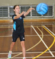 Hannah demonstrating chest pass technique