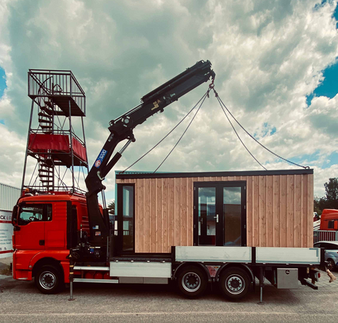 Transport of container tiny house by truck