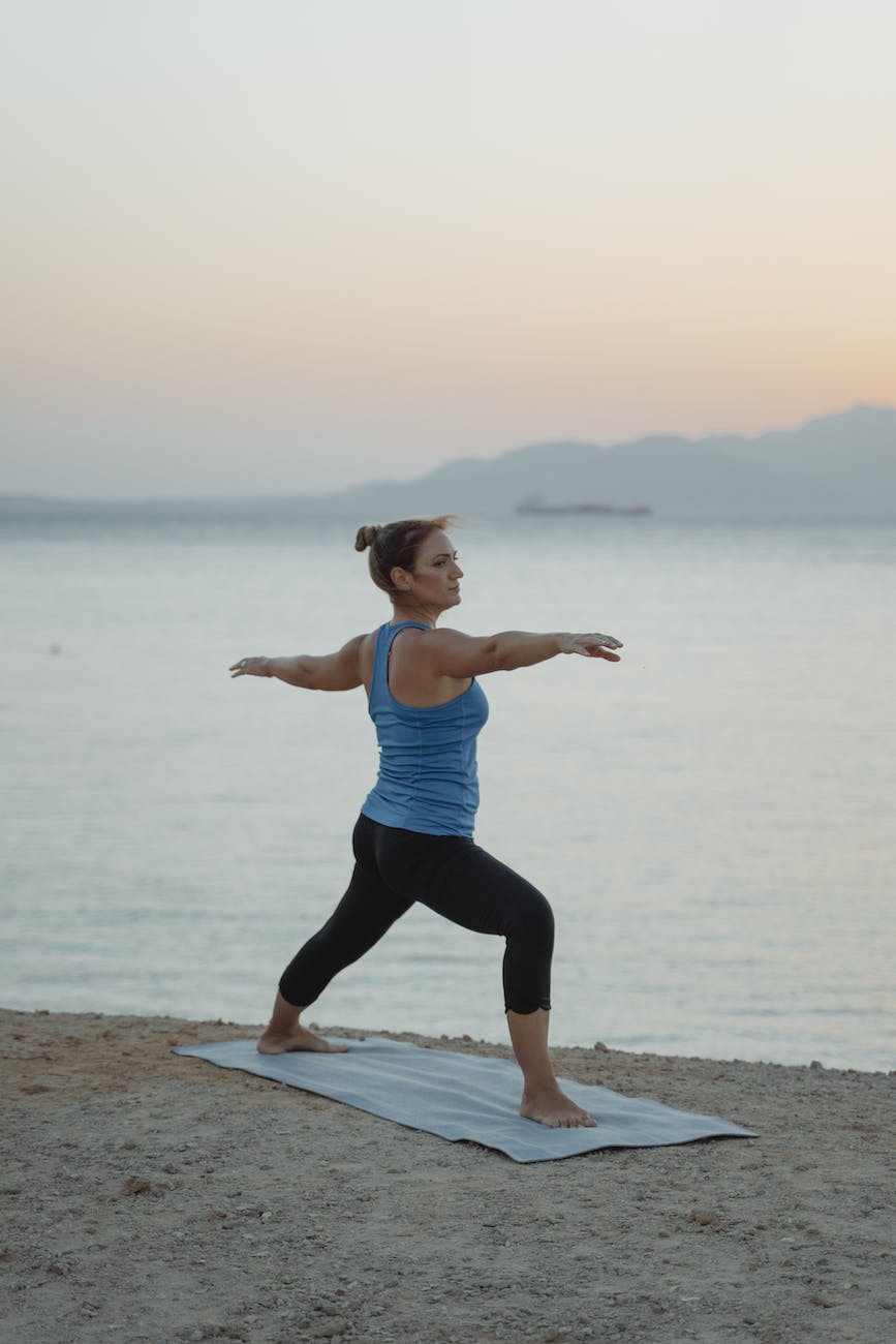 woman doing warrior 2 pose