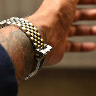 Tudor Black Bay red bezel on oyster bracelet.