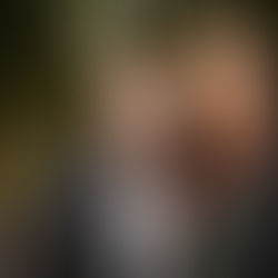 A Routes to Work client (Jai) standing outdoors with her caseworker Jade, both smiling confidently. The image reflects positive employability support, improved confidence and the social value impact of personalised guidance in North Lanarkshire, Scotland.