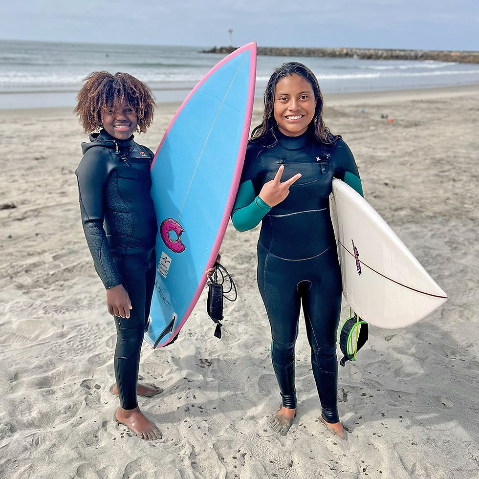 Maizy Gordon and he sister together at Oceanside Harbor Local Break Surf Magazine