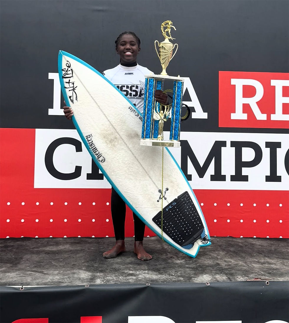 Maizy Gordon holding a trophy after a surf competition, Local Break Surf Magazine.
