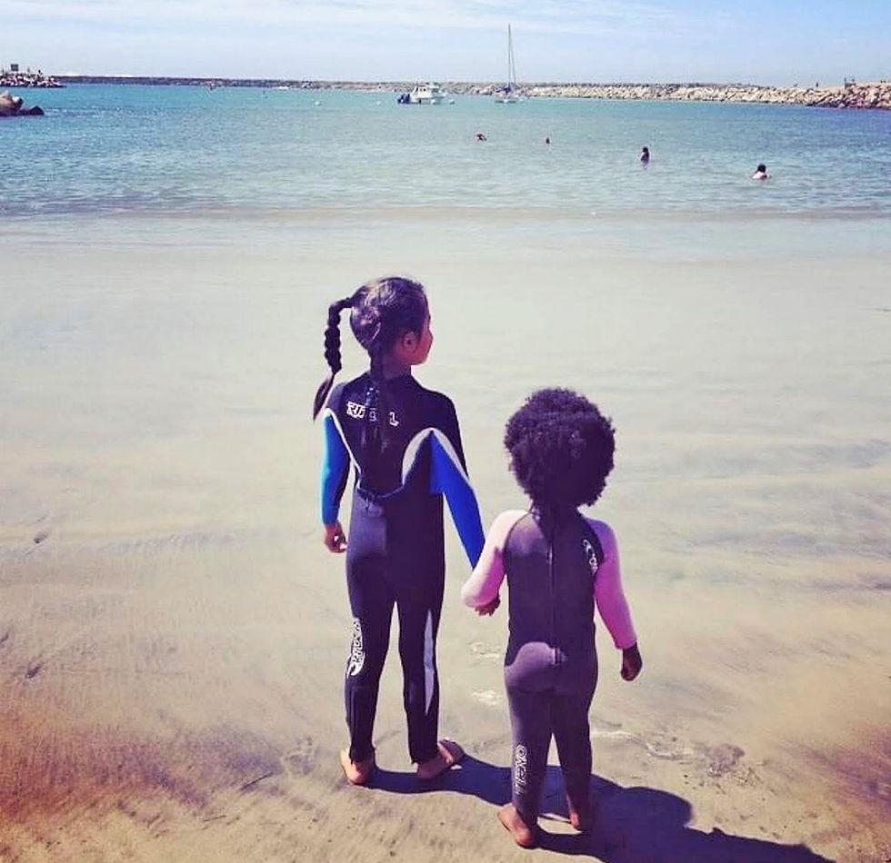 Maizy Gordon and he sister together in the early years. Local Break Surf Magazine