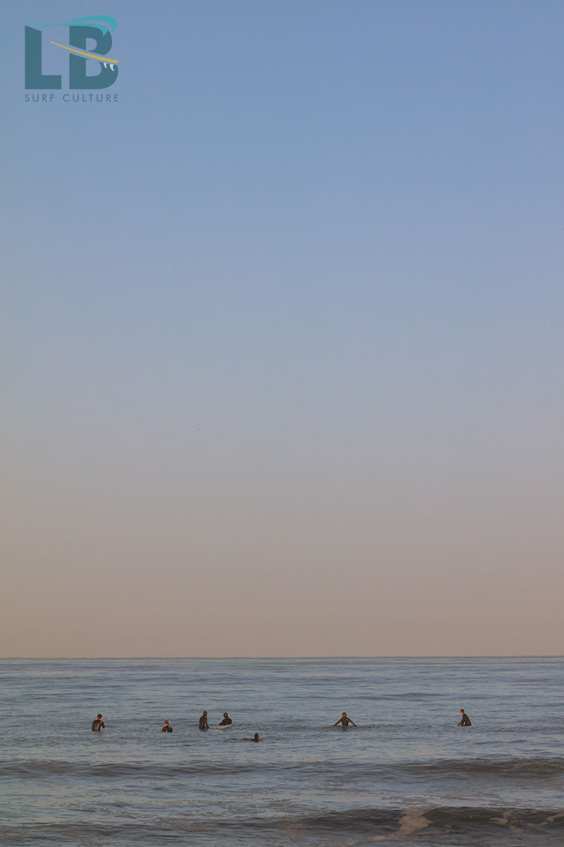 Local Break Magazine First Light Surf Club, SoCal, North County San Diego surf club. Surfers waiting for a set in Carlsbad California.