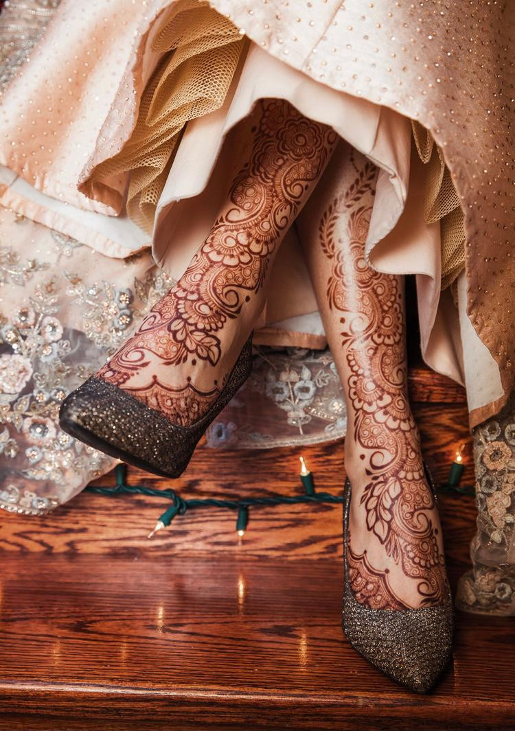 The final photo depicts henna designs on the feet, ankles and legs of a bride beneath her wedding dress.