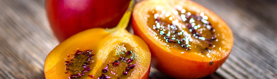 Fresh fruit tamarillo on wooden background.jpg