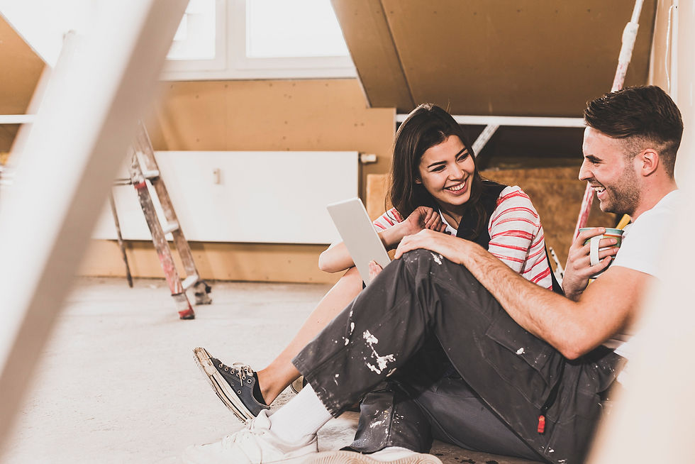 couple-relaxing-and-laughing-during-home-renovatio-2026-01-05-00-35-37-utc.jpg
