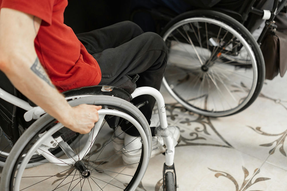 Child and participant in a wheelchair outdoors, representing planned holiday support and participation.