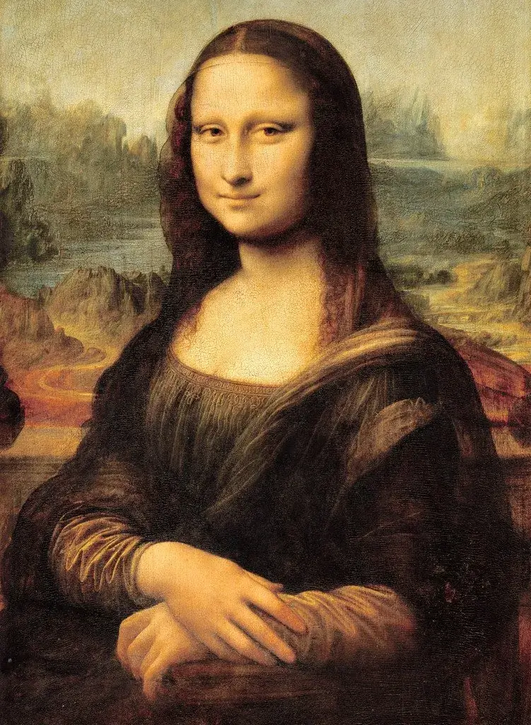 Il celeberrimo quadro La gioconda di Leonardo Da Vinci. La monna Lisa è raffigurata seduta con le mani una sull'altra. Il suo sguardo sembra rivolgersi all'osservatore e seguirlo, mentre il sorriso è semiaperto. Lo sfondo è realizzato su più piani e sembra una scena onirica che sfuma sempre di più.
