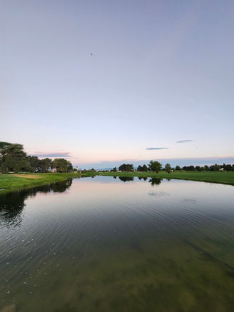 An irrigation pond incoculated with phytoplankton to reduce nutrient load and provide a biostimulant to the soil.  