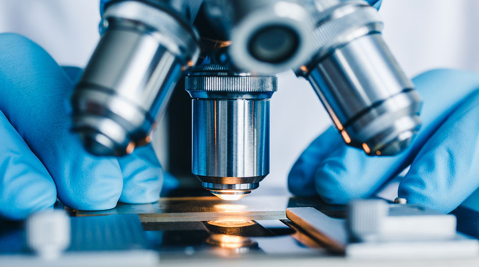 Close-up shot of microscope with metal lens at laboratory..jpg