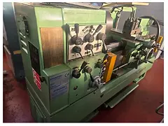 alt="Quadro comandi e scatola avanzamenti tornio parallelo Stanmilano usato, matricola 92074, certificato CE."