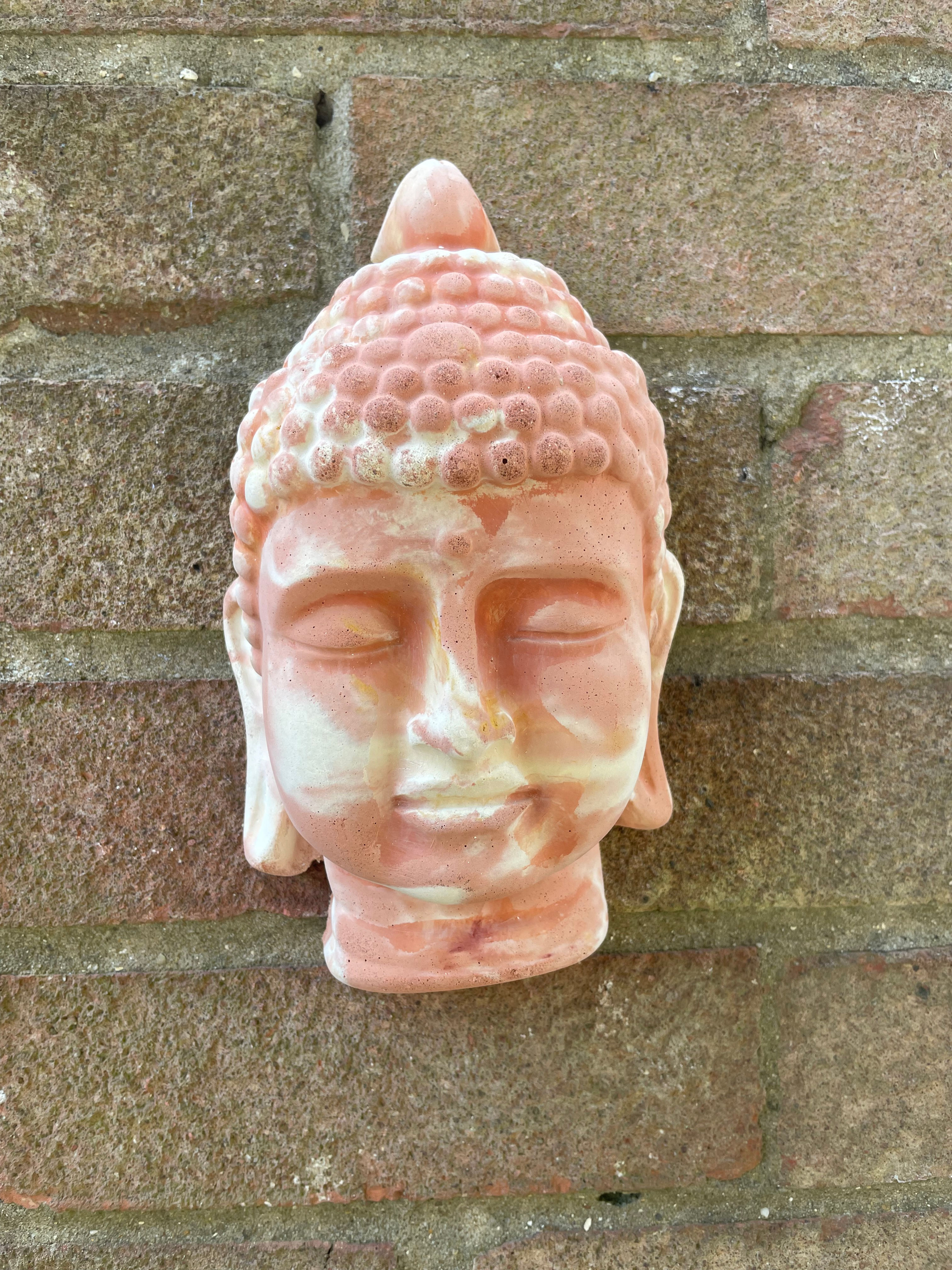 Unique Buddha head wall ornament in terracotta and yellow