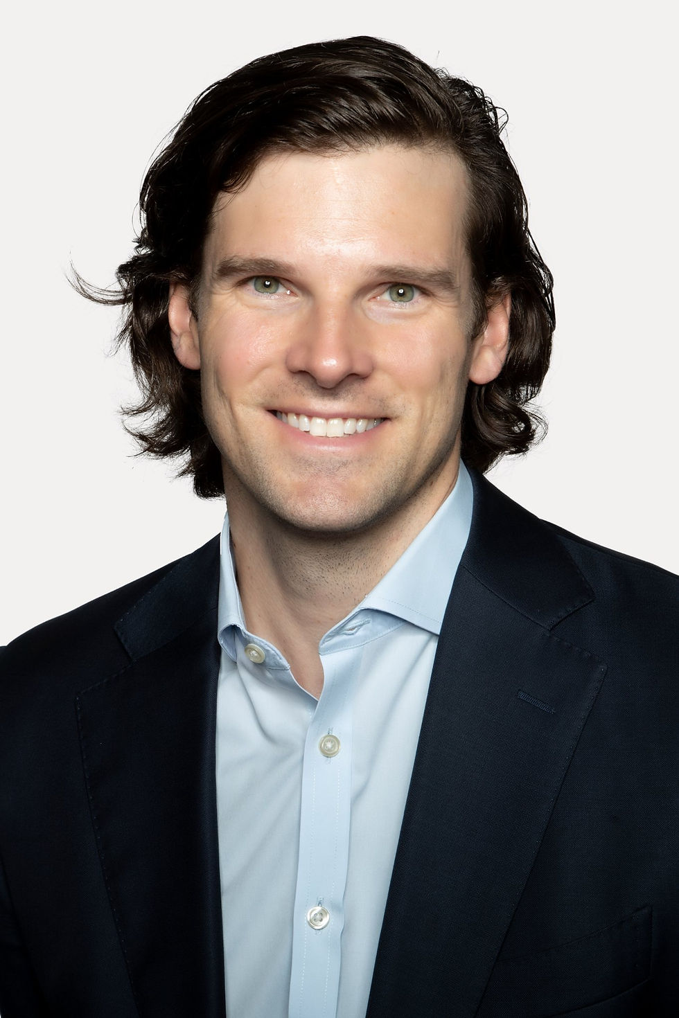 Headshot Photography for Professionals in NYC Man in suit professional business real estate headshot