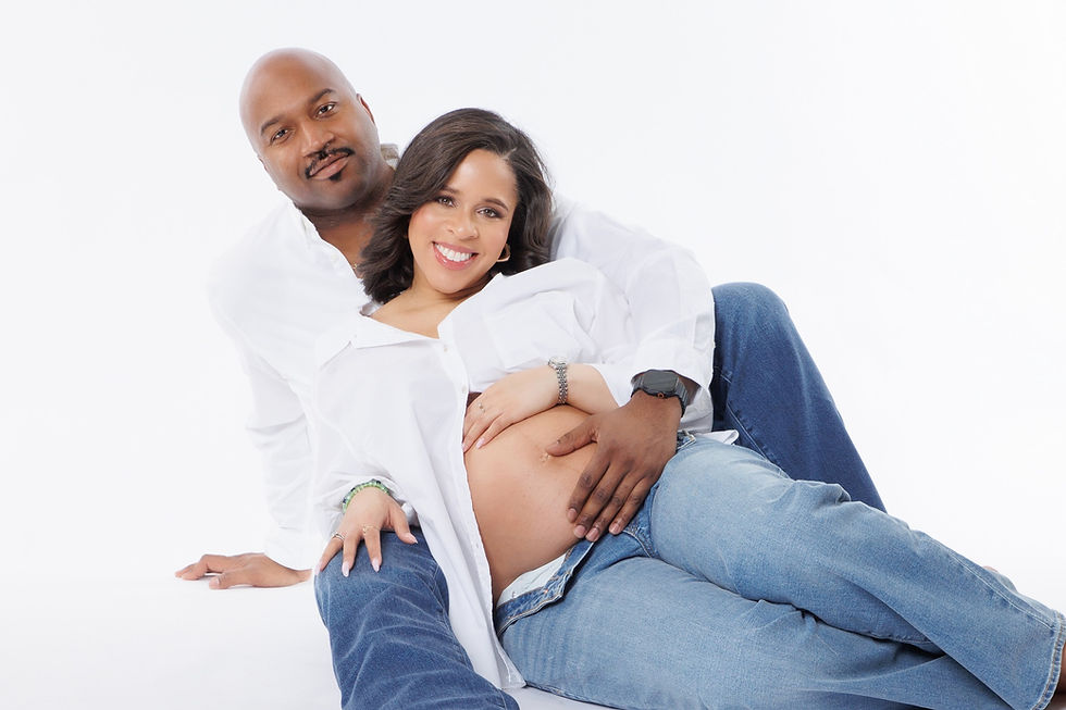 Professional maternity photographer capturing pregnancy silhouette