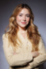Professional ERAS headshot of a medical student in a suit on a neutral background