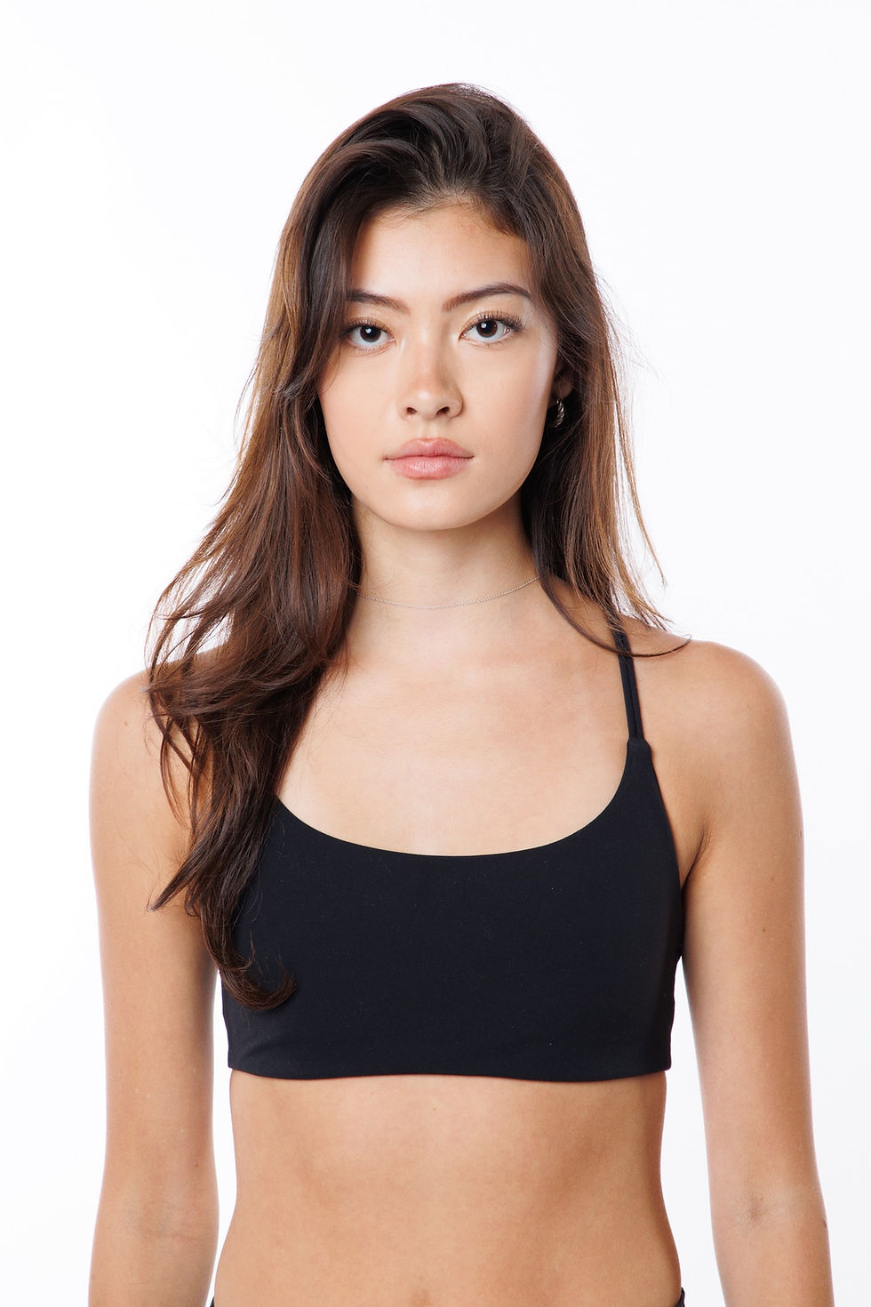 Model posing for digital polaroid style modeling photos at Tals Studio NYC with simple background.