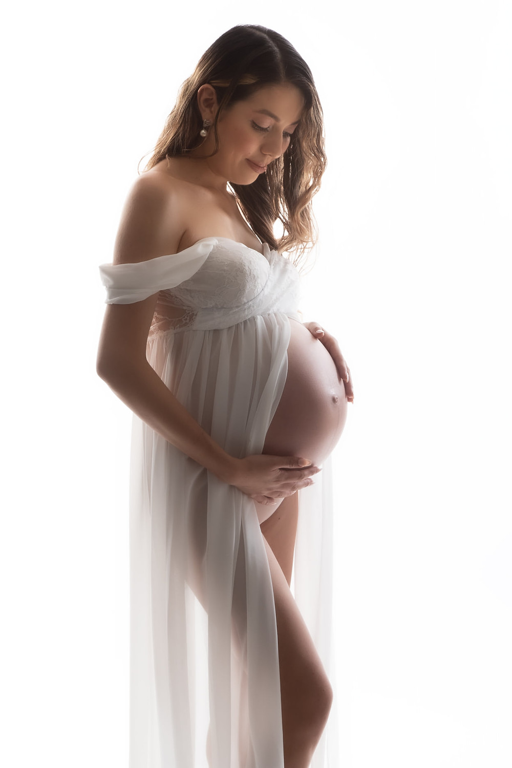 Maternity Photographer at Tals Studio in New York City. Expert Maternity Photography Special $249 www.talsstudio.com/maternity 646-300-2216 At TALS Studio, we work with you to create the most beautiful, timeless maternity photos for all soon-to-be-parents! Book your Maternity Photoshoot right now! A photoshoot is a perfect way to capture this unique life moment of having a baby. We offer a personalized photography experience, focused on you and your special moment. Photographer Yoni Levy has 40 years of photography experience and knows how to capture the graceful, wholesome, and loving parts growing family. Come to our studio for a beautiful maternity shoot to remember this moment forever! 1 Hour Session - $249 10 Final retouched images (100-120 Pictures) Unlimited Poses / Sittings / Changes Hi-Resolution Copies Perfect for Print Low-Resolution Copies Perfect for Online Bring your own wardrobe fabrics and an additional wardrobe is on-site to be used in the photoshoot Book Now