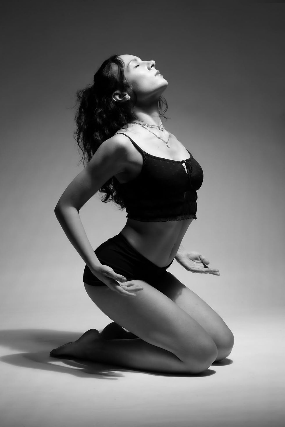 Dance photographer capturing movement in studio session