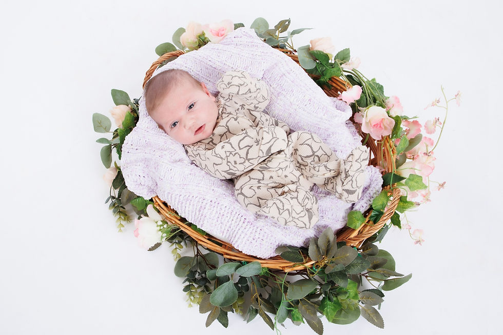 Professional baby portrait with family in Manhattan studio