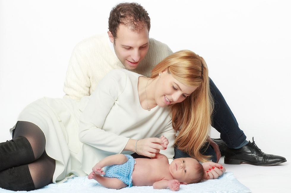 newborn photography NYC parents holding baby