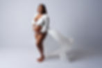 NYC maternity photography session at Tals Studio capturing elegant portraits of expecting mothers in Manhattan.