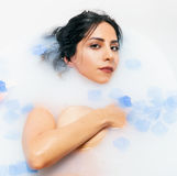 Boudoir Milk bath Photoshoot. Shot By Yoni Levy at TALS Studio NYC. Bathtub Photoshoot