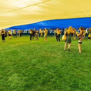 New York, NY - August 24, 2022: Hundreds of people gathered at Central Park to celebrate Independence Day of Ukraine and unfurled huge 60x40 m Ukrainian flag Photo By Zion Yoni Levy / Tals Studio 