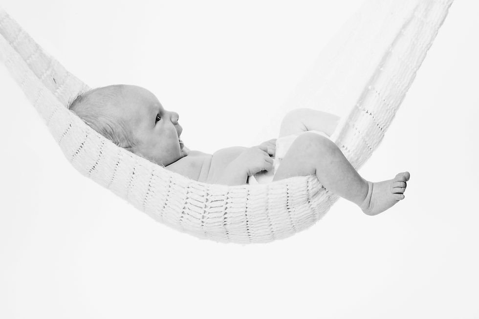 Professional newborn photography NYC with parents and baby