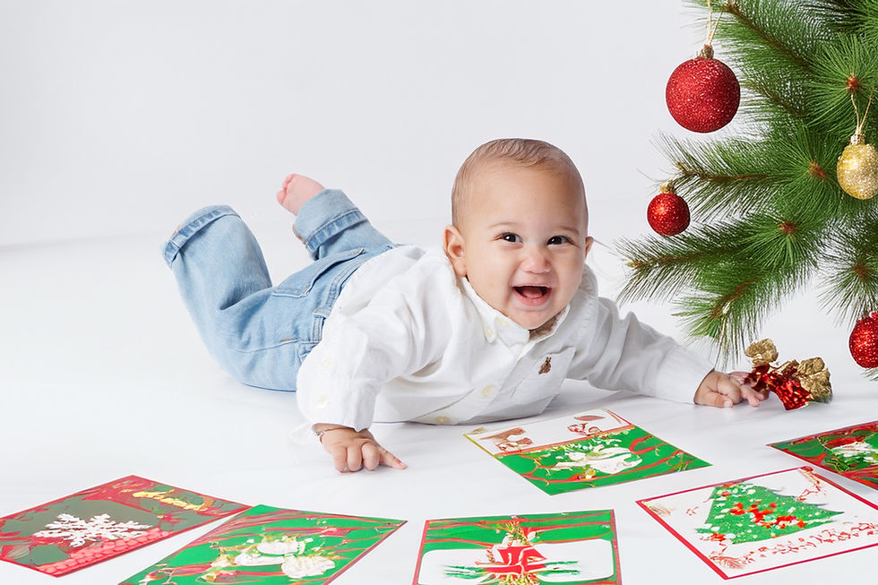 Holiday and Christmas photography at Tals Studio – $199 family portrait session in NYC with festive backdrops