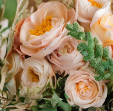 a bride holding an artificial spring floral bouquet_edited.jpg