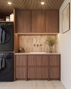 Buanderie aménagée avec rangements sur mesure