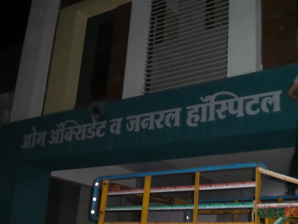 om hospital , sangamner