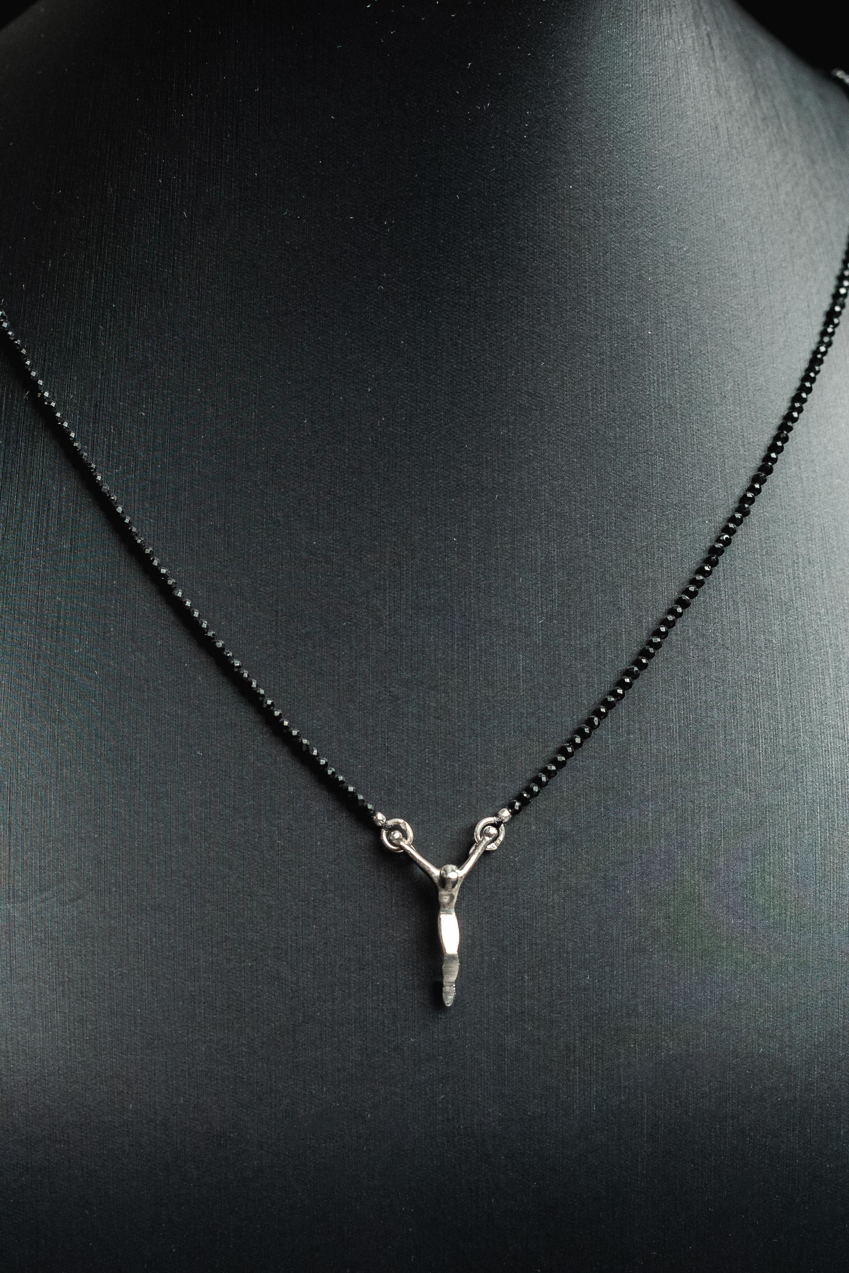 Cristo mini em espinélio